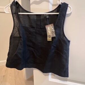 Black sleeveless blouse with buttons in the back